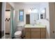 Functional bathroom featuring a classic design with a vanity and tiled shower, offering a neat and tidy space at 1208 Francis Ave, Sarasota, FL 34232