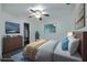 Inviting bedroom with soft lighting, neutral decor, ceiling fan, and ample closet space at 1208 Francis Ave, Sarasota, FL 34232