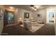 Comfortable living room with ample natural light, neutral furniture, and an inviting atmosphere at 1208 Francis Ave, Sarasota, FL 34232