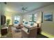Bright living room featuring neutral tones, comfortable seating, and ample natural light at 1208 Francis Ave, Sarasota, FL 34232