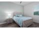 Comfortable bedroom featuring a rustic wood bed frame, and neutral-toned walls at 15808 42Nd E Gln, Parrish, FL 34219