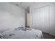 Bright bedroom with closet, laminate floors, and neutral color scheme at 15808 42Nd E Gln, Parrish, FL 34219