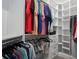 Well-organized walk-in closet with custom shelving, drawers, and ample storage space at 15808 42Nd E Gln, Parrish, FL 34219