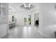 Bright foyer featuring tile floors, double doors to the outside, and an octagonal tray ceiling at 15808 42Nd E Gln, Parrish, FL 34219