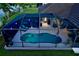 Screened pool area featuring a pool, lounge chairs, and outdoor seating at 15808 42Nd E Gln, Parrish, FL 34219