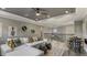 Upstairs living room featuring a large sectional, cozy seating, and stylish decor at 16415 Star Grass Cir, Bradenton, FL 34211