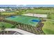 Sports field featuring a basketball court, volleyball court, and open green space for various outdoor activities at 16415 Star Grass Cir, Bradenton, FL 34211