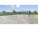 Well-maintained sand volleyball court, perfect for recreation and community fun on a sunny day at 16415 Star Grass Cir, Bradenton, FL 34211