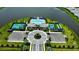 An aerial view of a waterfront community pool, tennis court, and parking area with lush landscaping at 18068 Cherished Loop, Bradenton, FL 34211