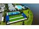 The aerial view includes a pool, tennis court, and bocce ball court, all beautifully landscaped near a lake at 18068 Cherished Loop, Bradenton, FL 34211