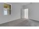Inviting bedroom featuring neutral decor and plenty of natural light, creating a cozy retreat at 18068 Cherished Loop, Bradenton, FL 34211