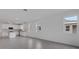 Open concept home with bright living area leading to a modern kitchen at 18068 Cherished Loop, Bradenton, FL 34211