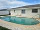 Enjoy this backyard pool with patio, perfect for relaxing and entertaining outdoors at 2004 40Th W St, Bradenton, FL 34205