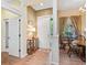 Welcoming entryway with decorative accents and a view into the dining area at 280 Dahlia Ct, Bradenton, FL 34212