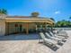 Covered poolside lounge area with comfortable seating and a relaxing atmosphere at 280 Dahlia Ct, Bradenton, FL 34212