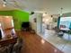 Open-concept dining area next to a bright kitchen with access to the living room at 3918 Wake Ave, Sarasota, FL 34241
