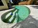 Backyard swimming pool with built-in steps, concrete surround, and a serene garden setting at 3918 Wake Ave, Sarasota, FL 34241