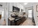 Well-equipped kitchen with stainless steel appliances, stylish backsplash, and ample counter space at 441 62Nd St, Holmes Beach, FL 34217
