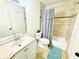 Full bathroom with a shower-tub combo and a nice vanity at 5238 Sunridge Palms Dr, Tampa, FL 33617