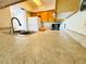 Bright kitchen with a neutral countertop and cabinets, providing a clean and functional space at 5238 Sunridge Palms Dr, Tampa, FL 33617