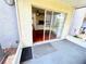 Enclosed patio with tile flooring and sliding glass doors leading to the living area at 5238 Sunridge Palms Dr, Tampa, FL 33617