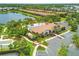 Community clubhouse with pool, walking paths and gorgeous landscaping in the Bellacina by Casey Key neighborhood at 5596 Cantucci St, Nokomis, FL 34275