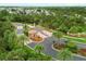 Bellacina by Casey Key community entrance with lush landscaping, mature palms and a decorative gate at 5596 Cantucci St, Nokomis, FL 34275