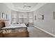 Bright bedroom featuring a large window, and seating area at 5596 Cantucci St, Nokomis, FL 34275