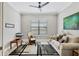Comfortable living room features large window and decorative furnishings at 5596 Cantucci St, Nokomis, FL 34275