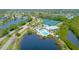 Community amenities include a pool, tennis courts, clubhouse, and winding roadways surrounded by lakes at 719 Estuary Dr # 719, Bradenton, FL 34209