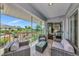 Charming screened porch offers outdoor seating with peaceful garden and lake views at 719 Estuary Dr # 719, Bradenton, FL 34209