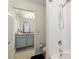 Well-lit bathroom with shower tub combo and large vanity at 731 116Th Ne Ct, Bradenton, FL 34212