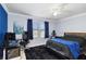 Bedroom boasts comfortable bed and dark colored rug at 731 116Th Ne Ct, Bradenton, FL 34212