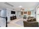 Upstairs living room with tv, ceiling fan and comfortable seating area at 731 116Th Ne Ct, Bradenton, FL 34212