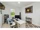 Comfortable home office boasts natural light and neutral color scheme at 731 116Th Ne Ct, Bradenton, FL 34212