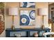 Stylish entryway featuring blue artwork, matching lamps, and decorative vases at 7324 Gulf Dr # 12, Holmes Beach, FL 34217