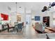 Cozy living room with a chandelier, fan, comfortable seating, and stylish decor at 7904 Hampton Ct, University Park, FL 34201