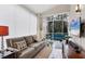 Comfortable sun room with a view of the screened in patio and backyard at 7904 Hampton Ct, University Park, FL 34201
