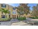Inviting townhome community with well-maintained landscaping, private garages, and manicured trees at 8823 White Sage Loop # 1802, Lakewood Ranch, FL 34202