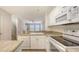 Modern kitchen featuring a dishwasher and stainless steel appliances at 8823 White Sage Loop # 1802, Lakewood Ranch, FL 34202