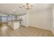 Bright open-concept area with kitchen view and access to additional living spaces at 8823 White Sage Loop # 1802, Lakewood Ranch, FL 34202