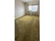 Cozy bedroom featuring natural light from the window and neutral walls at 9950 62Nd N Ter # 401, St Petersburg, FL 33708