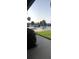 Inviting community pool area with lounge chairs, mature palms and a refreshing place to relax at 9950 62Nd N Ter # 401, St Petersburg, FL 33708