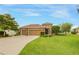Attractive home exterior with a well-manicured lawn and neat landscaping, plus a 3-car garage at 2819 47Th E St, Palmetto, FL 34221