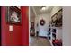 Inviting entryway with decorative accents, artwork, and a tiled floor leading to the front door at 2819 47Th E St, Palmetto, FL 34221