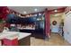 Bright kitchen with dark cabinets, a black refrigerator, and an inviting entryway in view at 2819 47Th E St, Palmetto, FL 34221