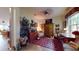 Cozy living room with decorative furniture, a floral rug, and large windows for natural light at 2819 47Th E St, Palmetto, FL 34221