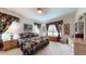 Serene bedroom with floral bedding, a wooden chest, and bright windows at 2819 47Th E St, Palmetto, FL 34221