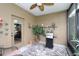 Well-equipped screened patio with a grill, furniture, and decor, perfect for outdoor relaxation at 2819 47Th E St, Palmetto, FL 34221