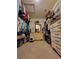 Spacious walk-in closet featuring built-in shelving, drawers, and ample storage space for clothing and accessories at 2819 47Th E St, Palmetto, FL 34221